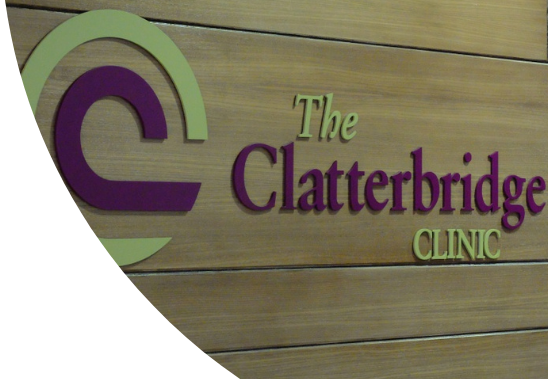 Clatterbridge spotlight The Clatterbridge Clinic logo on a wooden wall.